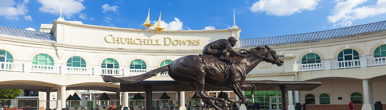 Louisville, Kentucky, USA - August 16, 2015:  Churchill Downs in Louisville, Kentucky with a statue of the Kentucky Derby winning horse, Barbaro.