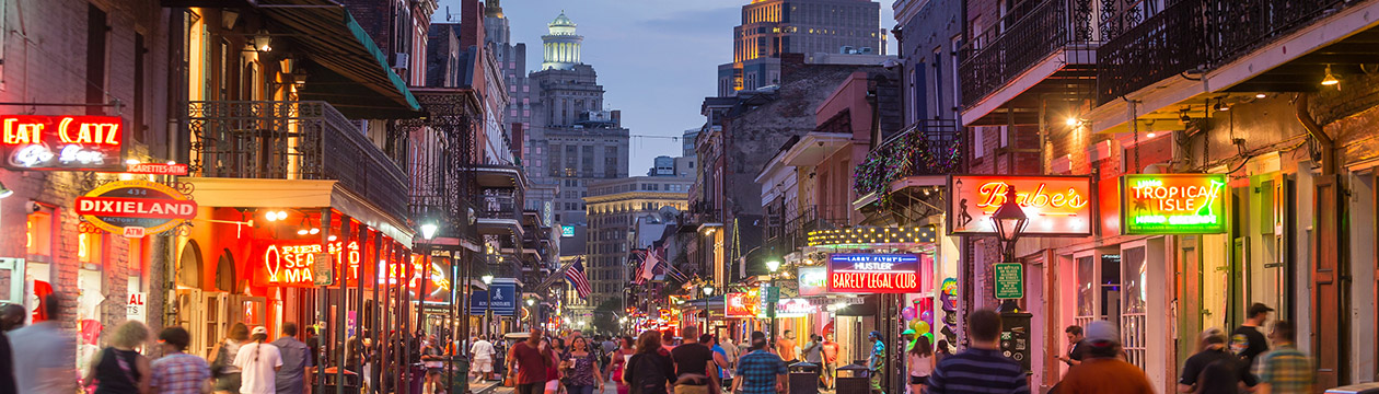 NEW ORLEANS, LOUISIANA - AUGUST 23: Pubs and bars with neon lights  in the French Quarter, downtown New Orleans on August 23, 2015.